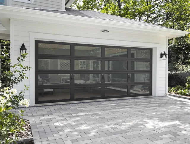 Wesley Chapel Garage Door Repair design specialist presenting custom garage door options to Wesley Chapel homeowner