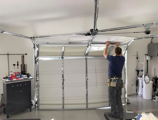 Wesley Chapel Garage Door Repair specialist performing precise section replacement on Wesley Chapel garage door