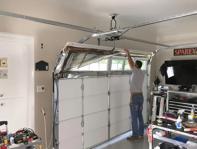 Garage door section replacement by Wesley Chapel Garage Door Repair in Wesley Chapel