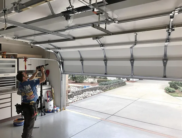 Garage door track repair service by Wesley Chapel Garage Door Repair in Wesley Chapel